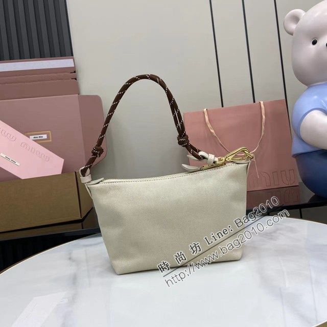 MIU MIU專櫃繆繆最新款帆布飯盒包肩背包 jh2938型號：5NE841